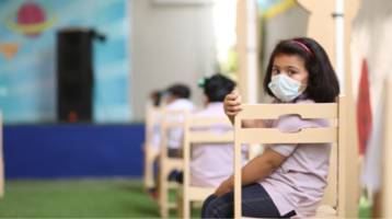 school child in a mask