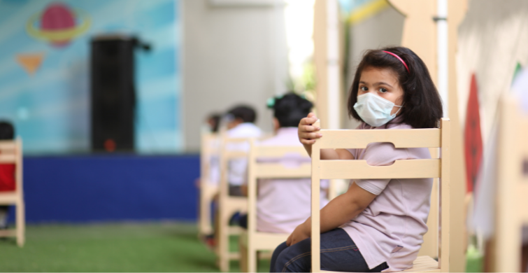 school child in a mask